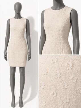 Dolce & Gabbana 
Beautiful cream coloured dress EUC